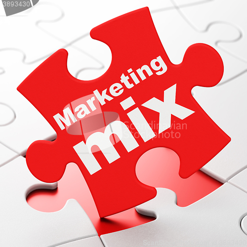 Image of Advertising concept: Marketing Mix on puzzle background