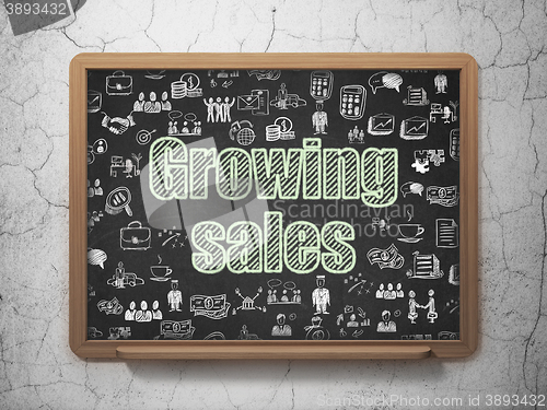 Image of Business concept: Growing Sales on School board background