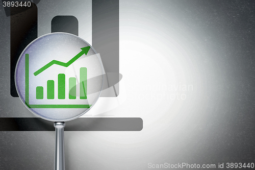 Image of Finance concept:  Growth Graph with optical glass on digital background