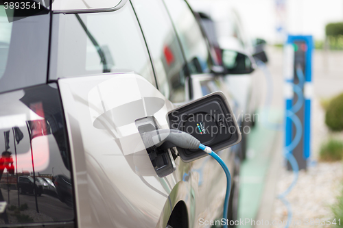 Image of Electric Car in Charging Station.