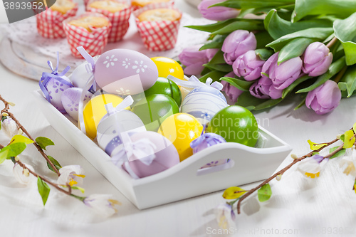 Image of Easter place setting with painted eggs