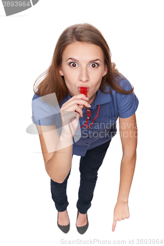 Image of Female blowing a whistle and pointing at you