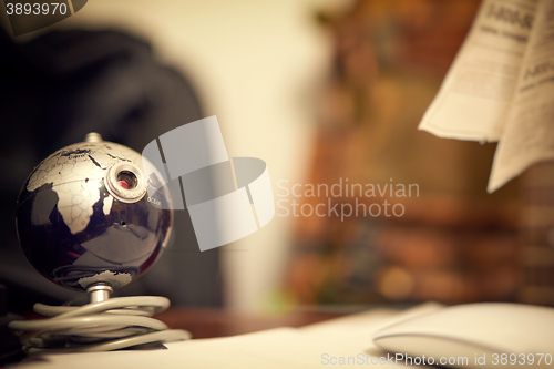 Image of Web camera in a form of globe on table