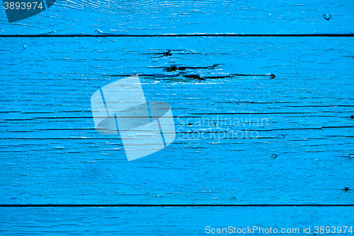 Image of Old wooden planks painted with blue paint