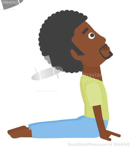 Image of Man practicing yoga.