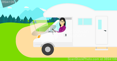 Image of Woman driving motor home.