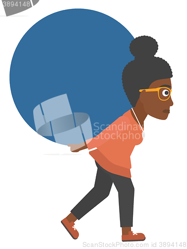 Image of Woman carrying big ball.