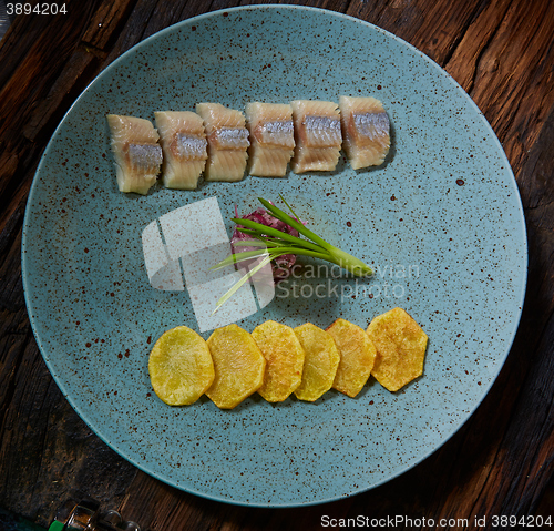 Image of herring with potatoes