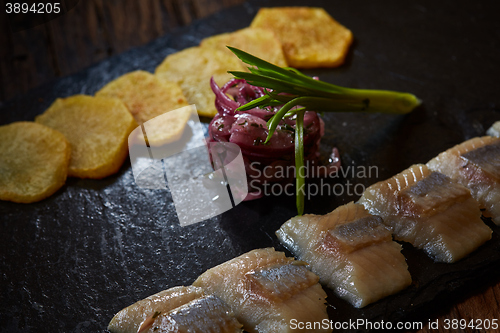 Image of herring with potatoes