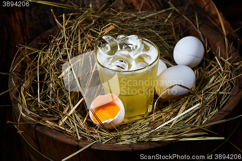 Image of Whiskey Sour with ice cubes 