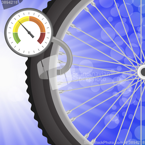 Image of Manometer and Part of Bicycle Wheel