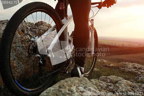 Image of Man cyclist riding the bicycle