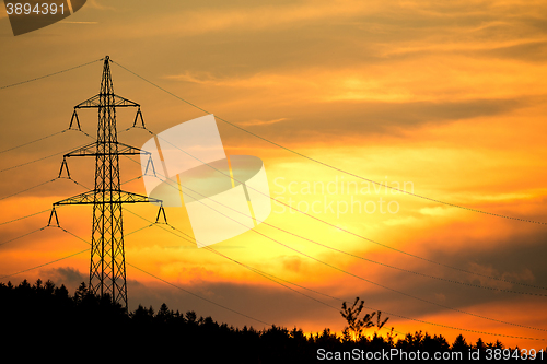 Image of sunset with electricity in countryside