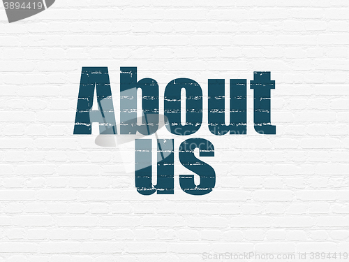 Image of Advertising concept: About Us on wall background