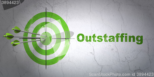 Image of Finance concept: target and Outstaffing on wall background