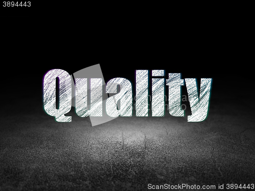 Image of Advertising concept: Quality in grunge dark room