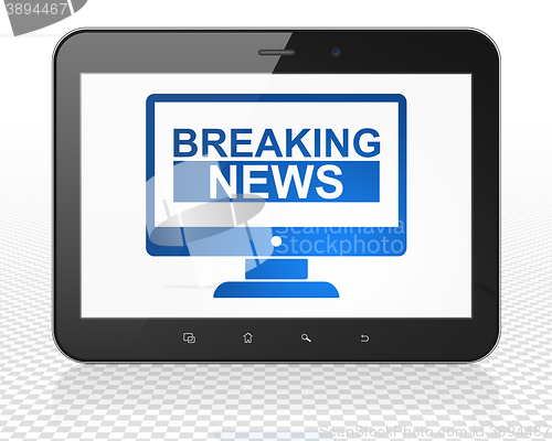 Image of News concept: Tablet Pc Computer with Breaking News On Screen on display
