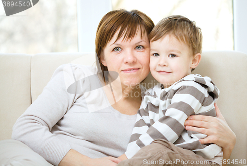 Image of Mother is having fun with her son