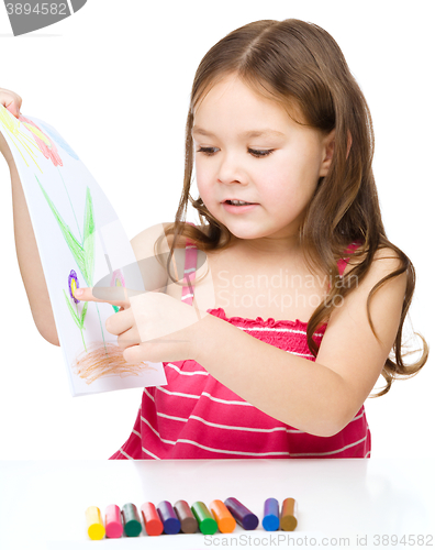 Image of Little girl is showing her drawing