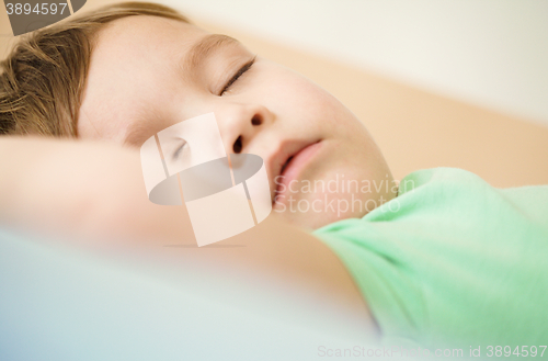 Image of Cute little boy is sleeping