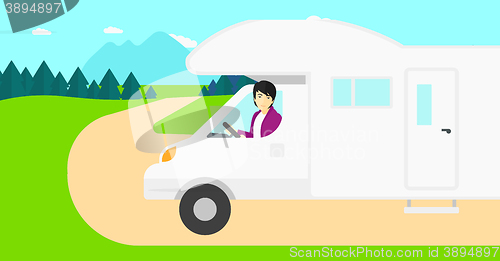 Image of Man driving motor home.