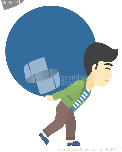 Image of Man carrying big ball.