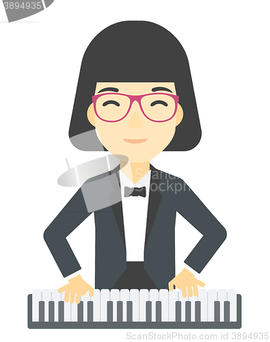 Image of Woman playing piano.