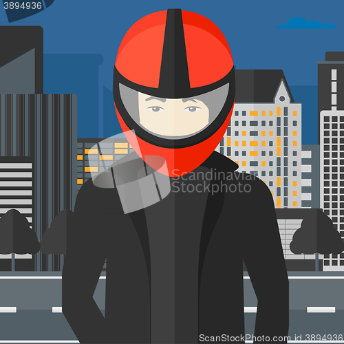 Image of Man in biker helmet.