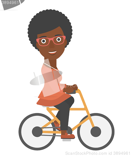 Image of Woman cycling to work.