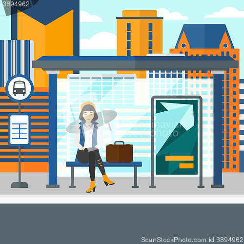 Image of Woman waiting for bus.