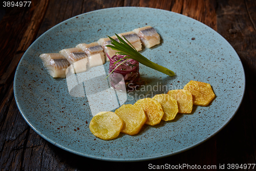 Image of herring with potatoes