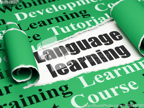 Image of Learning concept: black text Language Learning under the piece of  torn paper