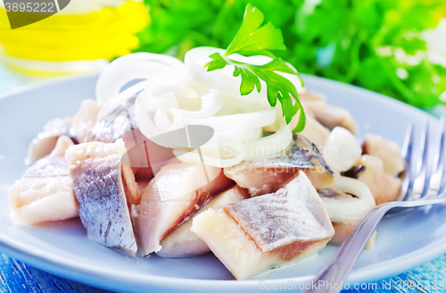 Image of herring with onion