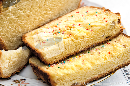 Image of Appetizing sweet white bread on the plate.