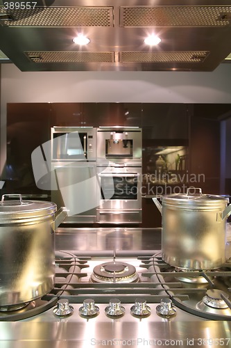 Image of interiors of kitchen with gas fryer