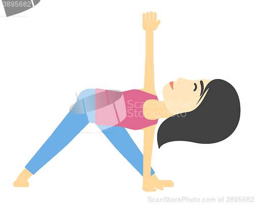 Image of Woman practicing yoga.