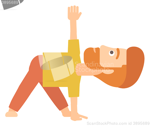 Image of Man practicing yoga.