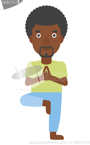 Image of Man practicing yoga.