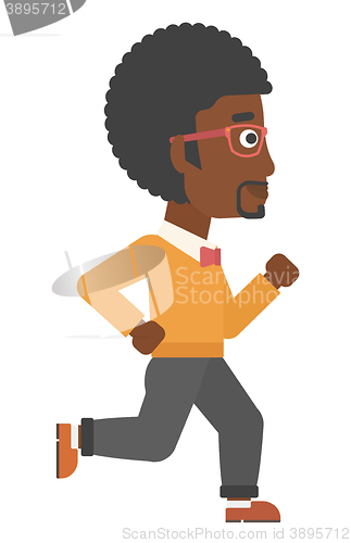 Image of Smiling businessman running.