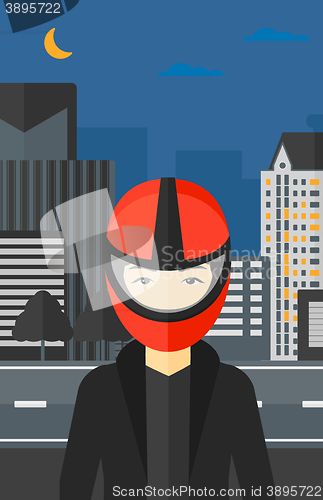 Image of Woman in biker helmet.