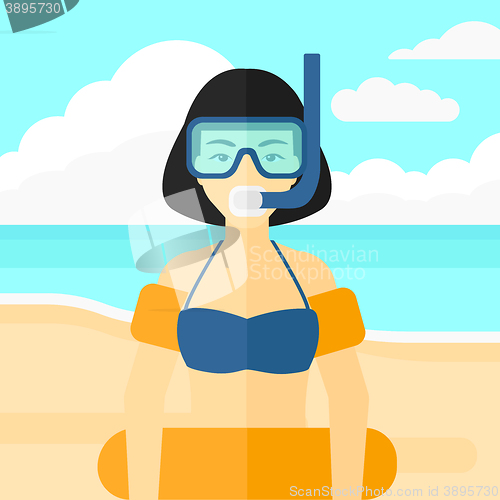 Image of Woman with swimming equipment.