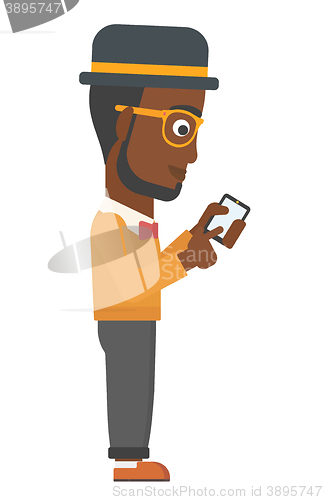 Image of Man using mobile phone