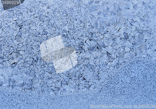 Image of Natural ice pattern on winter glass