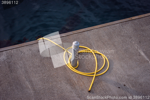 Image of Dock post with a yellow line