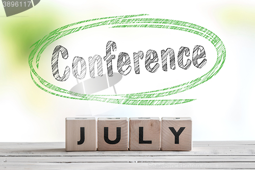 Image of July conference message on a stage