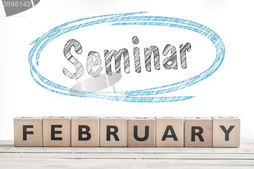 Image of February seminar sign made of wood