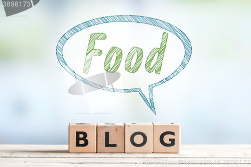 Image of Food blog message sign on a desk