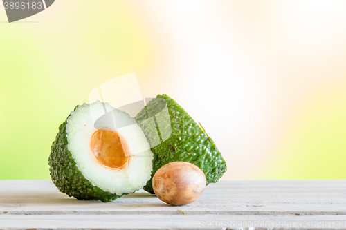 Image of Avocado on a wooden table
