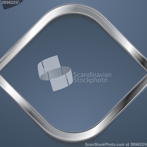 Image of Silver metal rhombus shape on blue background