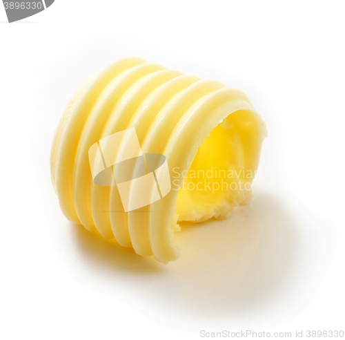 Image of butter curl on white background